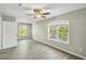 Bedroom with modern ceiling fan, luxury vinyl flooring, and lots of light at 213 Rose Ave, Walterboro, SC 29488