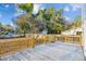 Wooden deck with natural finish and railings, perfect for enjoying the outdoors at 213 Rose Ave, Walterboro, SC 29488