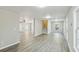 Open-concept living area features light gray flooring and bright natural light at 213 Rose Ave, Walterboro, SC 29488