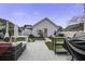 Outdoor space with a grill, patio furniture, and a white picket fence at 221 Trillium Ave, Summerville, SC 29483