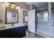 Updated bathroom featuring modern fixtures, a shower and a view into the bedroom at 221 Trillium Ave, Summerville, SC 29483
