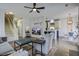 Cozy living area with a fireplace that opens to kitchen at 221 Trillium Ave, Summerville, SC 29483