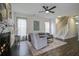 Warm and inviting living room with a fireplace and comfortable seating area at 221 Trillium Ave, Summerville, SC 29483