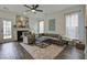 Cozy living room featuring a fireplace and a comfortable seating arrangement at 221 Trillium Ave, Summerville, SC 29483