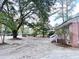 Expansive backyard featuring mature trees and a well-maintained lawn at 227 Bailey St, Walterboro, SC 29488