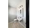 Clean bathroom features modern sink, toilet, and medicine cabinet at 227 Bailey St, Walterboro, SC 29488