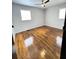 Bedroom featuring ceiling fan, hardwood floors and bright natural light at 227 Bailey St, Walterboro, SC 29488