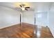 Inviting living area with hardwood floors, neutral walls, and an open layout leading to other rooms at 227 Bailey St, Walterboro, SC 29488
