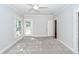 Bright bedroom with window, door to patio, and wall-to-wall carpet at 2517 Charter Oaks Dr, Mount Pleasant, SC 29466