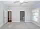 Main bedroom with carpet, ceiling fan, and access to en-suite bathroom at 2517 Charter Oaks Dr, Mount Pleasant, SC 29466