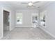 Main bedroom with carpet, ceiling fan and access to en-suite bathroom at 2517 Charter Oaks Dr, Mount Pleasant, SC 29466