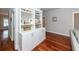 White built-in shelving with storage and display space at 2517 Charter Oaks Dr, Mount Pleasant, SC 29466