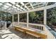 Spacious deck with pergola, bench and view of the backyard at 2517 Charter Oaks Dr, Mount Pleasant, SC 29466
