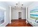 Elegant dining room featuring hardwood floors and a chandelier at 2517 Charter Oaks Dr, Mount Pleasant, SC 29466