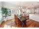 Spacious dining area with hardwood floors and kitchen views at 2517 Charter Oaks Dr, Mount Pleasant, SC 29466
