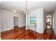 Open dining area with hardwood floors and views to other rooms at 2517 Charter Oaks Dr, Mount Pleasant, SC 29466