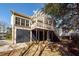 House with deck and pergola, providing shade and relaxation at 2517 Charter Oaks Dr, Mount Pleasant, SC 29466