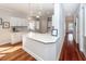 Modern kitchen featuring white cabinetry, quartz countertops, and hardwood floors at 2517 Charter Oaks Dr, Mount Pleasant, SC 29466