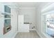 Laundry room with storage cabinets and shelving at 2517 Charter Oaks Dr, Mount Pleasant, SC 29466