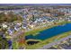 Aerial view of a house near a pond in a neighborhood at 2725 Battery Pringle Dr, Johns Island, SC 29455