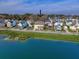 Aerial view of a house near pond in a community at 2725 Battery Pringle Dr, Johns Island, SC 29455