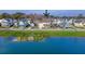 Aerial view of house near a pond in a neighborhood at 2725 Battery Pringle Dr, Johns Island, SC 29455