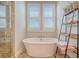 Relaxing bathroom with a freestanding tub and walk-in shower at 2725 Battery Pringle Dr, Johns Island, SC 29455