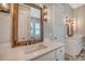Modern bathroom with a double vanity and a large mirror at 2725 Battery Pringle Dr, Johns Island, SC 29455