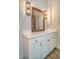 Bathroom boasts a vanity with quartz countertop and stylish light fixtures at 2725 Battery Pringle Dr, Johns Island, SC 29455