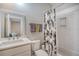Clean bathroom with shower/tub combo and white tile at 2725 Battery Pringle Dr, Johns Island, SC 29455