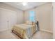 Cozy bedroom with double doors and a full-size bed at 2725 Battery Pringle Dr, Johns Island, SC 29455