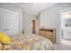 Bright bedroom with double doors and access to a full bath at 2725 Battery Pringle Dr, Johns Island, SC 29455