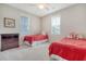 Bedroom with two twin beds, window, and dresser at 2725 Battery Pringle Dr, Johns Island, SC 29455