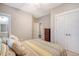 Well-lit bedroom with a queen-size bed and built-in dresser at 2725 Battery Pringle Dr, Johns Island, SC 29455