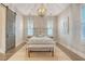 Bright bedroom with a rustic bed frame and coastal-themed art at 2725 Battery Pringle Dr, Johns Island, SC 29455