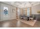 Formal dining room with hardwood floors and a rustic table at 2725 Battery Pringle Dr, Johns Island, SC 29455