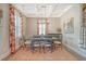 Bright dining room with a wood table, chairs, and decorative rug at 2725 Battery Pringle Dr, Johns Island, SC 29455