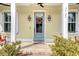Charming front door with wreath and sidelights, welcoming porch at 2725 Battery Pringle Dr, Johns Island, SC 29455