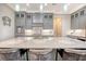 Island kitchen with gray cabinets, quartz counters, and stainless steel appliances at 2725 Battery Pringle Dr, Johns Island, SC 29455