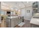 Open concept kitchen with gray cabinets, large island, and stainless steel appliances at 2725 Battery Pringle Dr, Johns Island, SC 29455