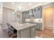 Modern kitchen with gray cabinets, quartz counters and stainless steel appliances at 2725 Battery Pringle Dr, Johns Island, SC 29455