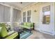 Bright screened porch with seating area and view of backyard at 2725 Battery Pringle Dr, Johns Island, SC 29455
