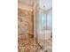 Large walk-in shower with pebble floor and built-in seat at 2725 Battery Pringle Dr, Johns Island, SC 29455