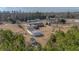 Property overview showing the house, shed, yard, and surrounding landscape at 2830 Wire Rd, Saint George, SC 29477