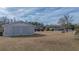 Expansive backyard featuring a storage shed and plenty of open space at 2830 Wire Rd, Saint George, SC 29477