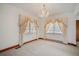 Bright bedroom with decorative curtains and carpeted floors provides a cozy retreat at 2830 Wire Rd, Saint George, SC 29477