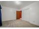 Inviting bedroom with carpet flooring, closet, and a door leading to another room at 2830 Wire Rd, Saint George, SC 29477