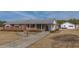 Well-maintained brick house with a spacious yard and a detached garage at 2830 Wire Rd, Saint George, SC 29477