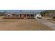 Ranch-style home with a brick facade, covered porch, and mature landscaping at 2830 Wire Rd, Saint George, SC 29477