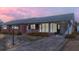 Charming brick home featuring a covered porch and well-maintained landscaping at 2830 Wire Rd, Saint George, SC 29477